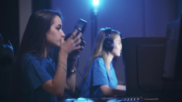 Group of Friends Walks in Gaming Club and Sits By the Computers