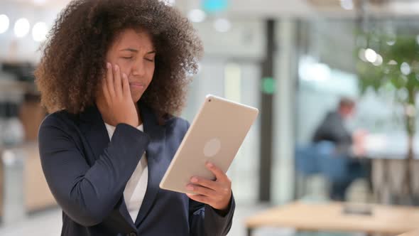 Young African Businesswoman Reacting To Loss on Tablet