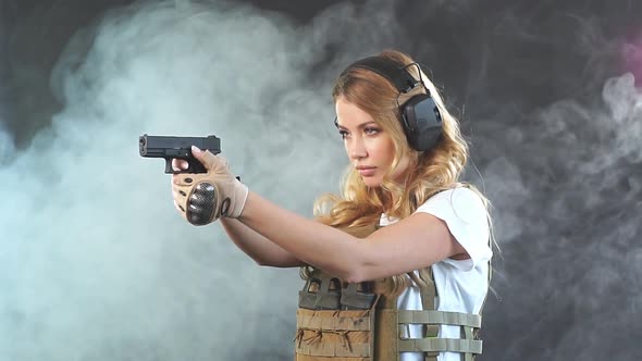 Woman Soldier in Military Uniform Developing Her Shooting Skills