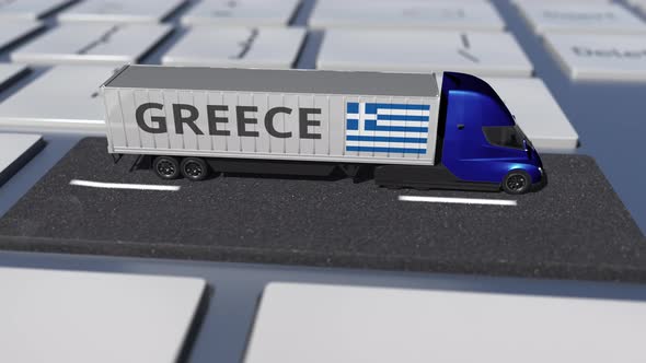 Flag of Greece on Moving Truck and Computer Keyboard