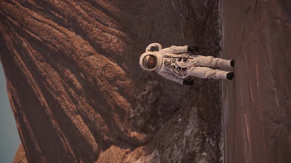 the Astronaut Steps Carefully Away From the Cliff