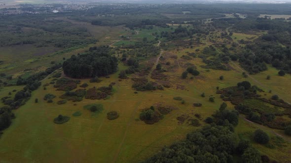 Aerial birds eye view shot flying over the beautiful Sutton Park in England