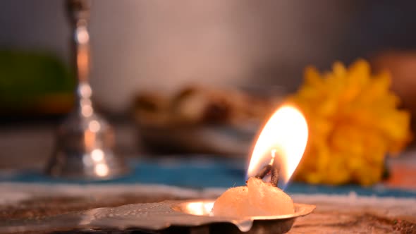 Aarti plate is a Hindu religious ritual of worship, a part of puja, in which light from wicks soaked
