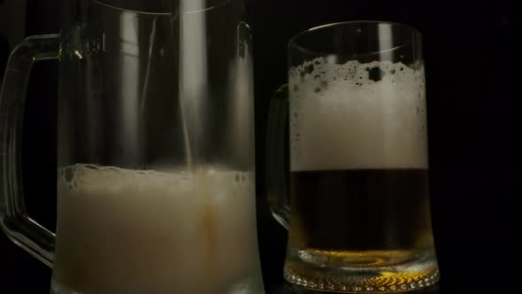 Beer Filling Mugs in Pub