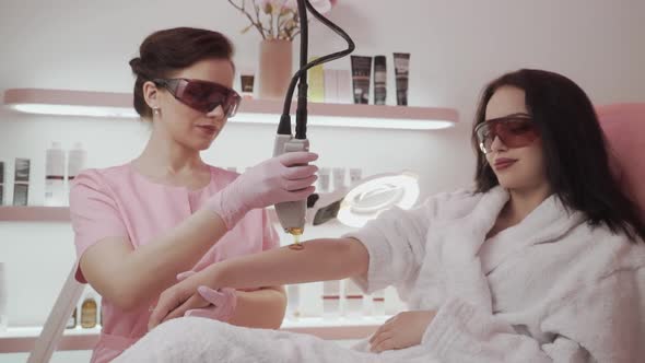 Laser Epilation and Cosmetology. Hair Removal Cosmetology Procedure. Laser Epilation and Cosmetology