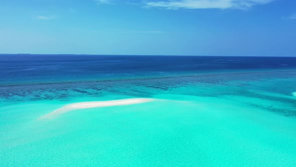 Tropical aerial tourism shot of a white sandy paradise beach and blue sea background in best quality