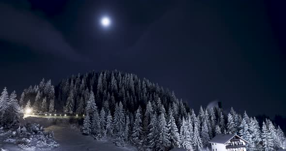 Snowy Mountain Landscape With Bright Full Moon On A Winter Night - Night Lapse