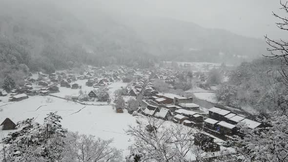 Snow Falling In Village