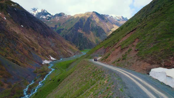 Car Moving on the Mountain Road Aerial View