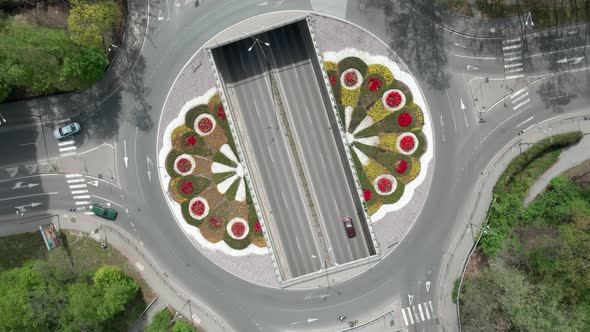 Top drone shot of a roundabout in Sofia, Bulgaria. Beautiful flowers arrangement in the roundabout.