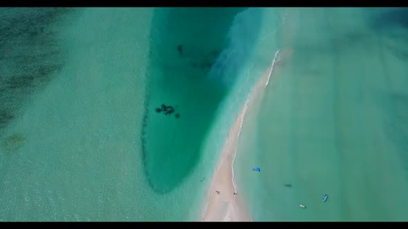 Aerial top down panorama of tropical coastline beach holiday by transparent sea and white sand backg