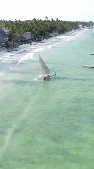 Vertical Video Boats in the Ocean Near the Coast of Zanzibar Tanzania