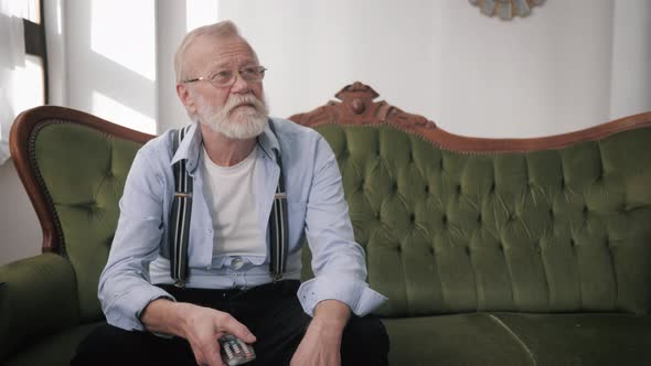 Portrait of Attractive Grandfathers with Gray Hair and Glasses for Vision and an Adult Beautiful