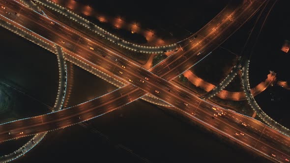 Aerial Top View of Highway Interchange at Night