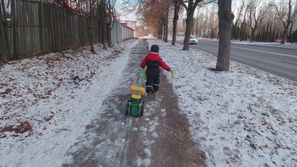 Boy Running With Toy Car Slow Motion