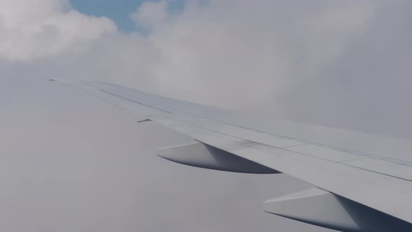 Big Clouds and Sky View From the Porthole Plane the Plane Flies High in the Sky Above the Clouds on