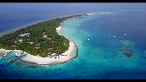 Aerial drone view seascape of tranquil bay beach vacation by blue ocean with clean sandy background 