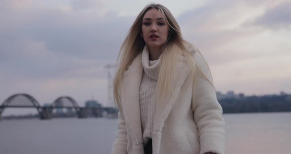 Slow Motion Fashion Blonde Woman Walking at Winter City