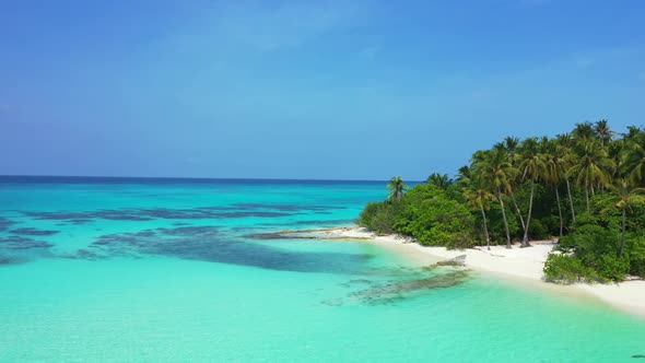 Aerial top down texture of perfect coastline beach trip by blue lagoon and bright sand background of