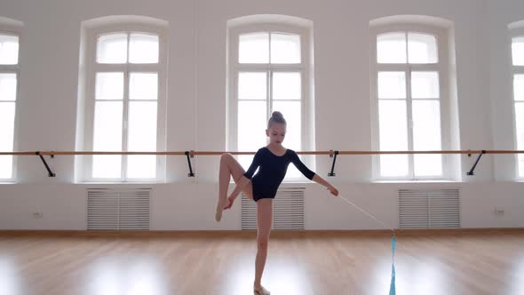 Girl Practicing Gymnastics in Studio