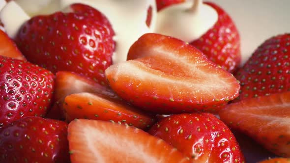 Cream Pours On Strawberries