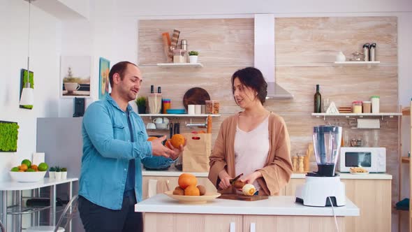 Man Doing Tricks with Oranges