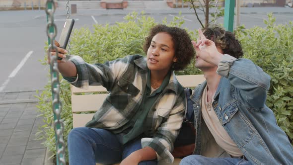 Friends Taking Selfie Outdoors