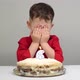 a Little Happy Boy Closed His Eyes To Ask Wishes for His Birthday - VideoHive Item for Sale