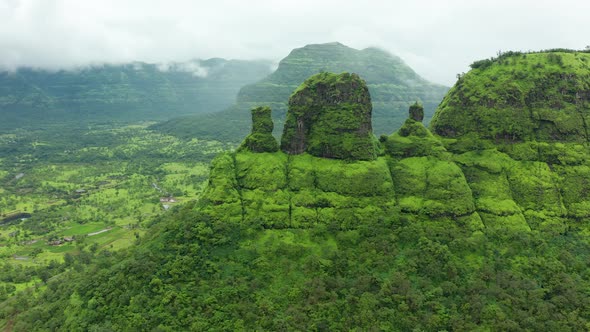 Sideways flying across the peaks of the Western Ghat mountains during the green season of the monsoo