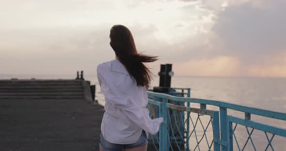 Freedom Young Happy Woman Running on the Pier