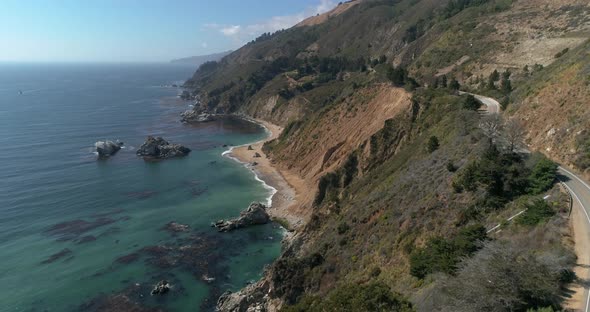 Aerial Slow motion view of Highway 1 near McWay Falls Julia Pfeiffer Burns Park Big Sur California