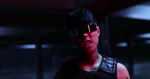 Cyberpunk Style. Aggressive Guy Shows Emotions. Night City