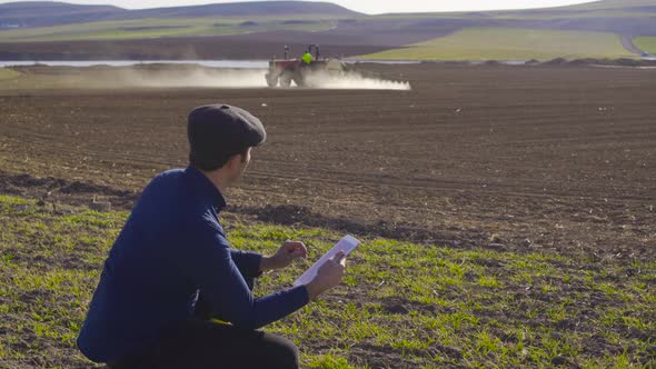 Tractor agrochemical and modern farmer.