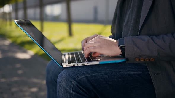 Male Hands Typing on Computer Keyboard