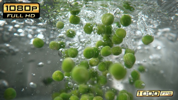 Green Peas Falling into Pot - Underwater View