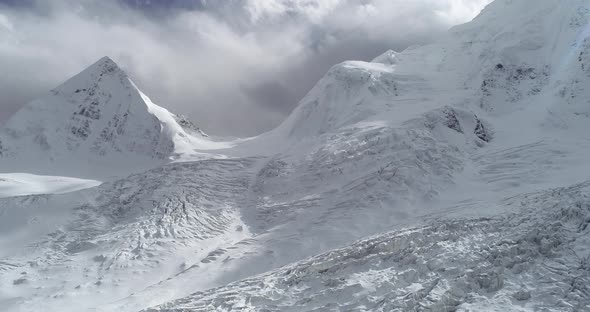 Flying drone approaching fossil glacier in tibet, China