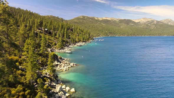 Drone footage flying over Private shoreline along Lake Tahoe at Crystal Bay Nevada
