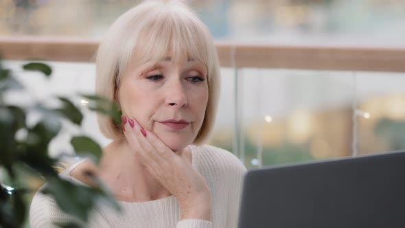 Closeup Mature Puzzled Caucasian Woman Thinking Deep in Thoughts Thoughtful Businesswoman Sitting in