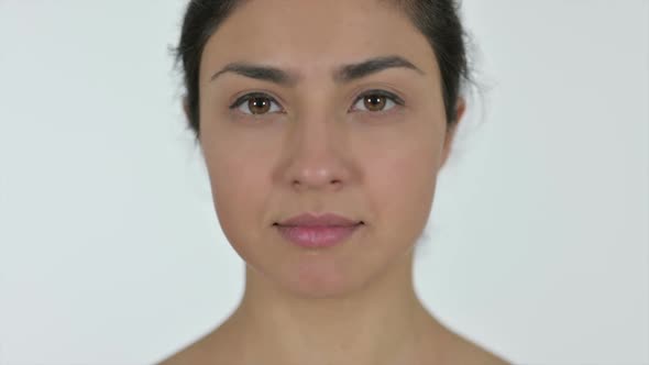 Close Up of Serious Indian Woman White Background