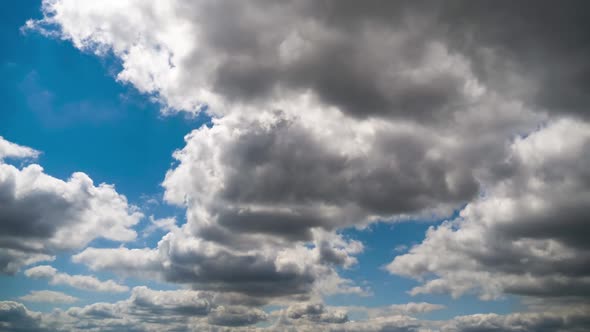 Clouds Move Smoothly in the Blue Sky. Timelapse. Cloud Space.