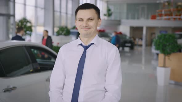 Portrait of a Successful New Car Salesman