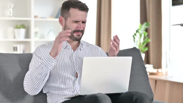 Loss Young Businessman Reacting to Failure on Laptop at Home