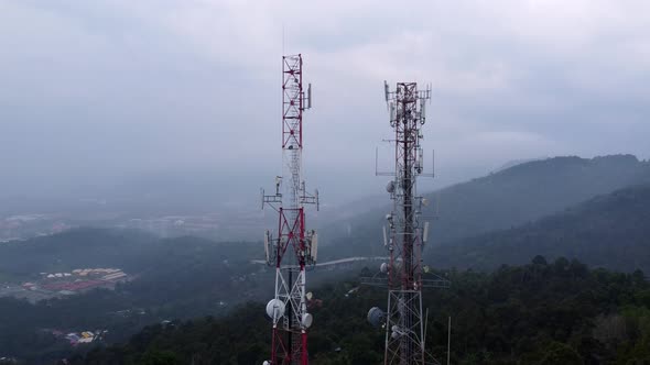 Aerial ascending telecommunication tower