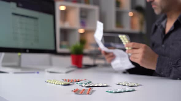 Medicine prescription and computer.