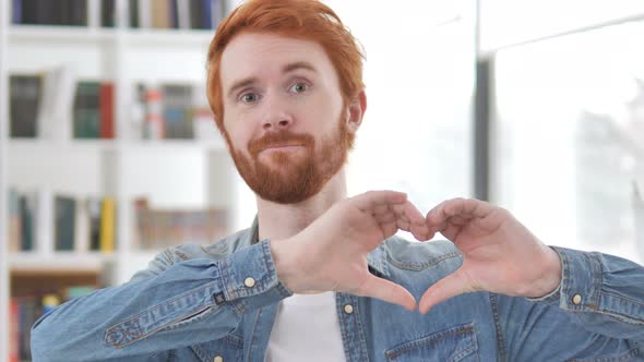 Heart Sign By Casual Redhead Man