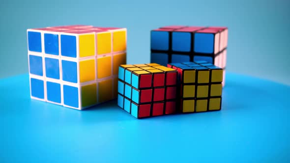 Conceptual large and small rubik's cube rotate