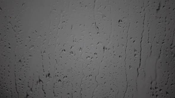 footage of window rain drops