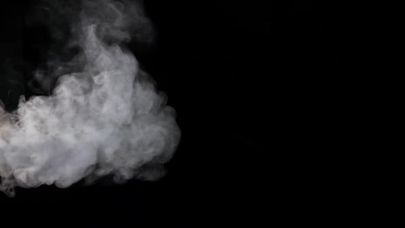 White Smoke with Large Wave on Black Background, Slow Motion