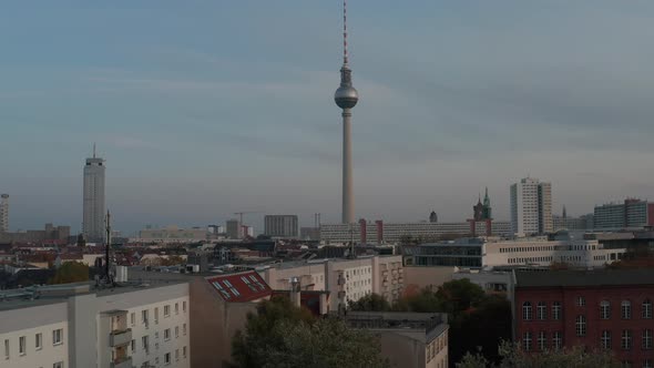 Forwards Reveal of Urban Neighbourhood Around Fernsehturm at Dusk