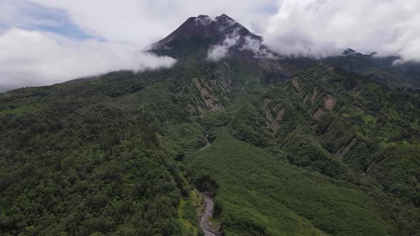 Aerial view of active Merapi mountain with clear sky in Indonesia